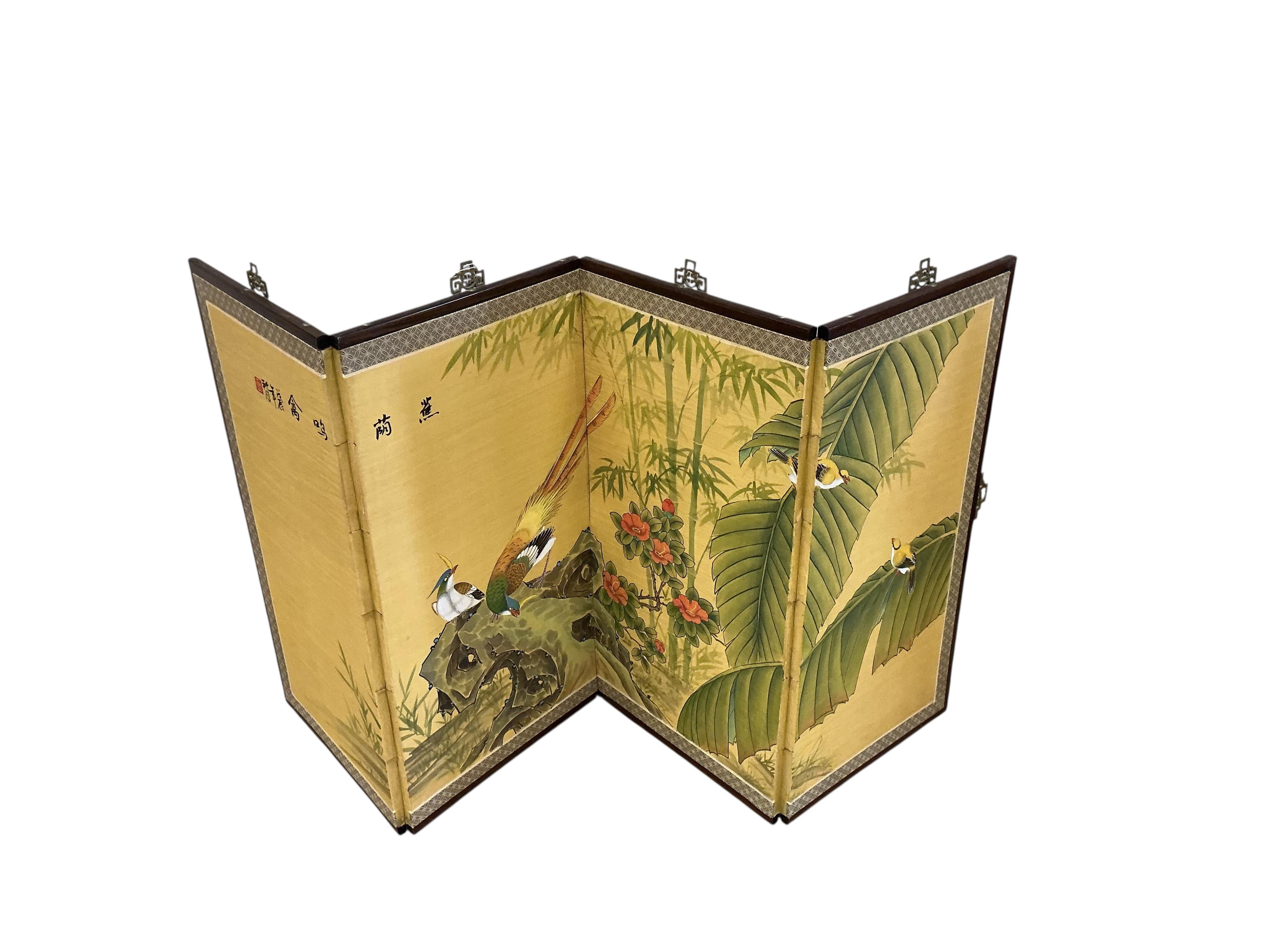 A modern Japanese gold ground four fold screen and a modern Japanese four panelled screen, larger height 92cm